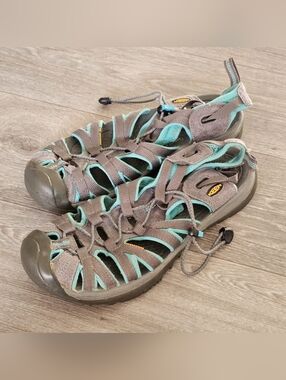The Keen Whisper Sandals are designed for women in size 11 with a stylish gray a
